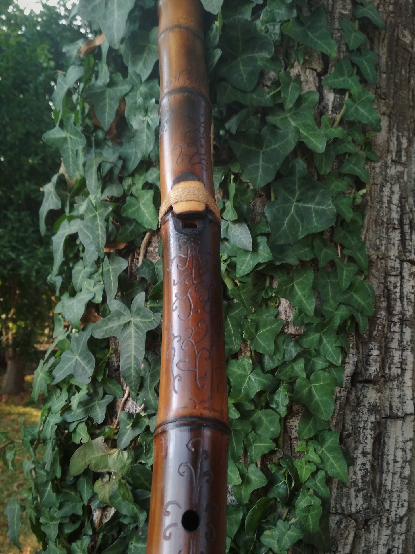 Ethnic Native American and Oriental Style Exotic Bamboo Flute. Rustic Meditative Flute