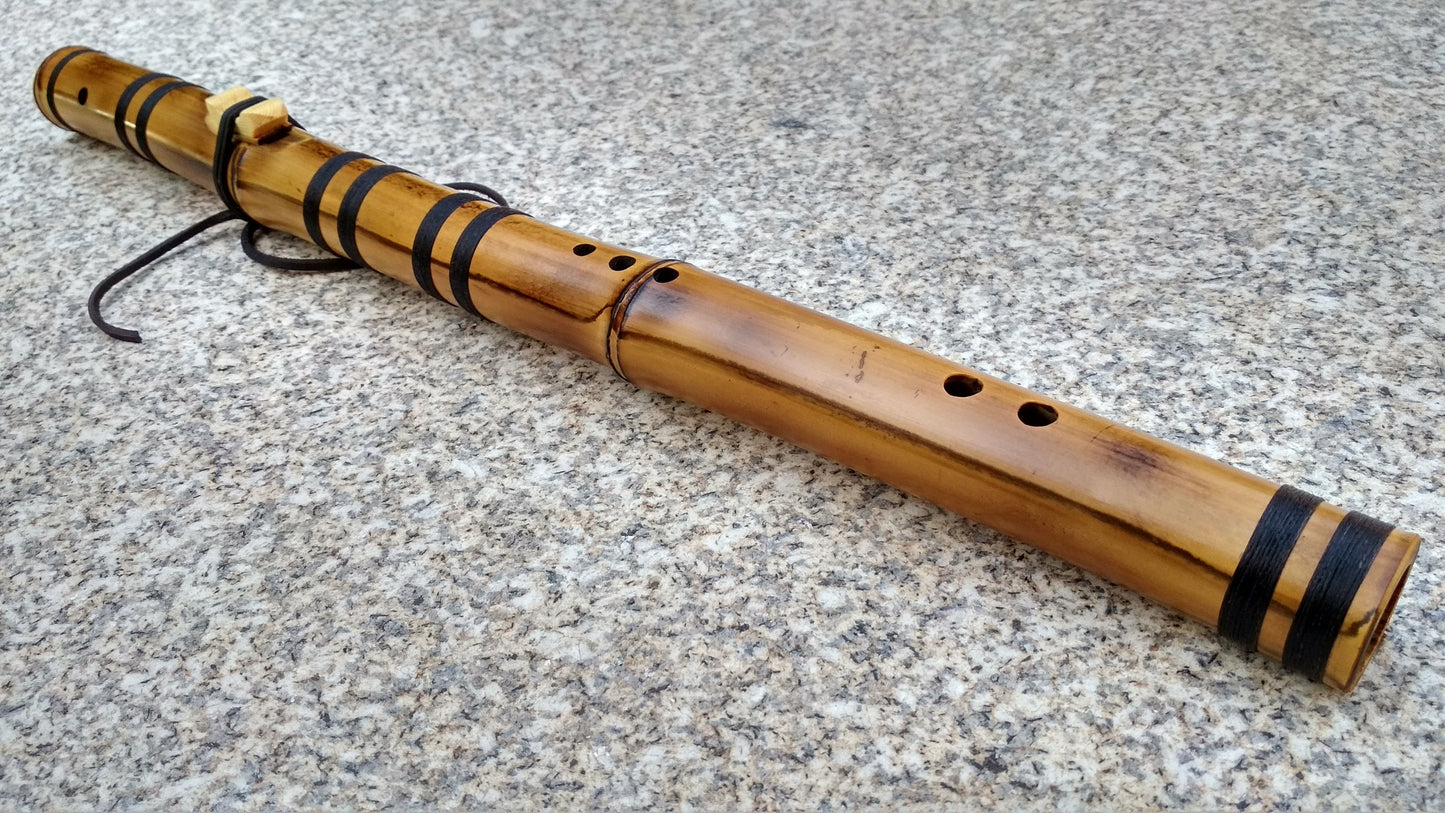 Deep meditative Kokin-Akebono bamboo flute. Ethnic Native American and oriental style. Rustic meditative flute.