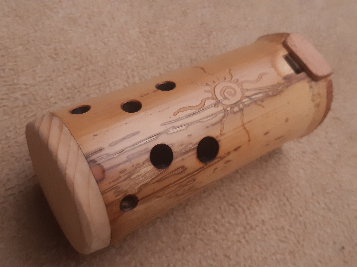 Native American Style Bamboo Ocarina in the key of F. Ethnic vessel flute in F minor pentatonic scale.
