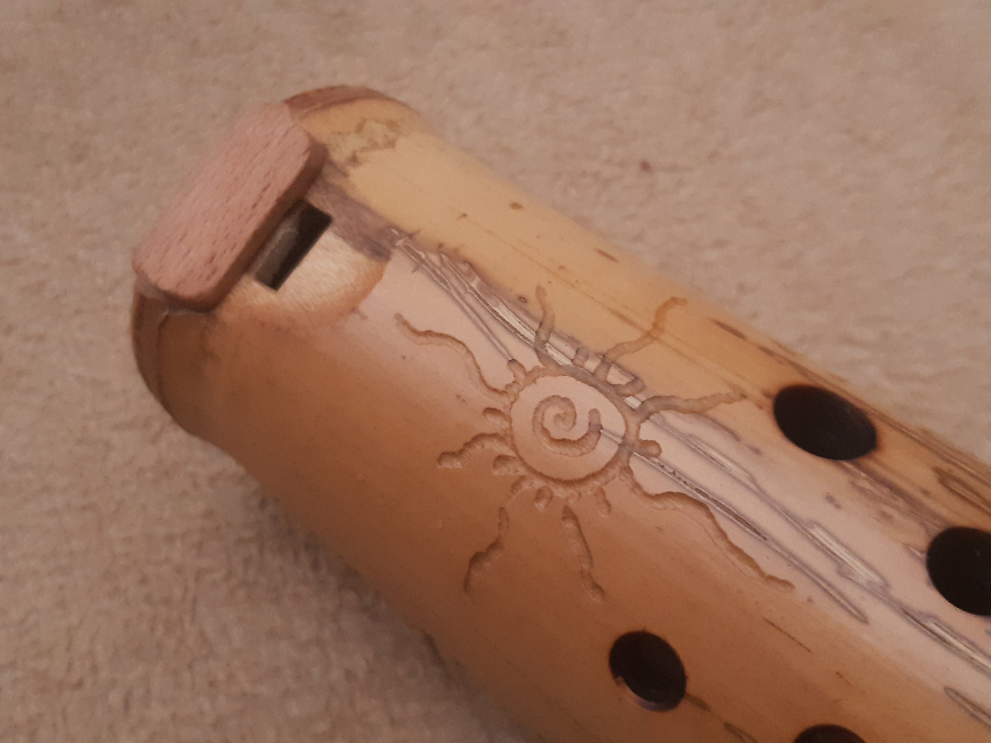 Native American Style Bamboo Ocarina in the key of F. Ethnic vessel flute in F minor pentatonic scale.