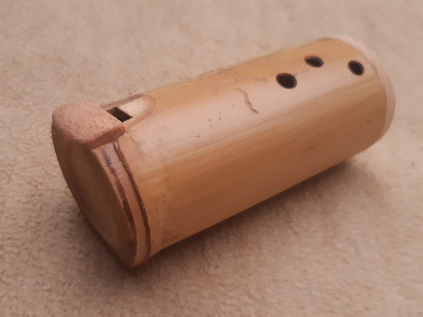 Native American Style Bamboo Ocarina in the key of F. Ethnic vessel flute in F minor pentatonic scale.