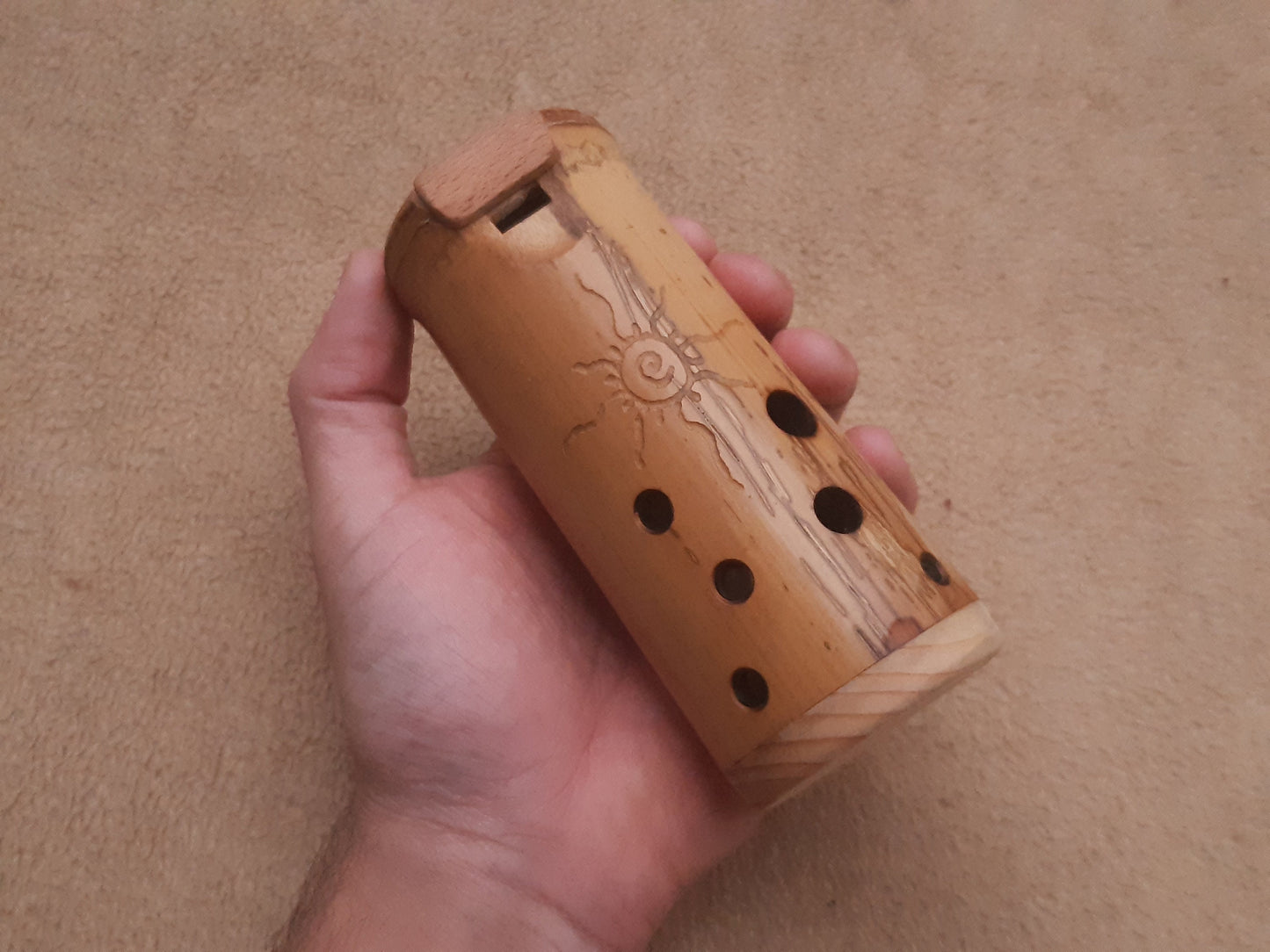 Native American Style Bamboo Ocarina in the key of F. Ethnic vessel flute in F minor pentatonic scale.