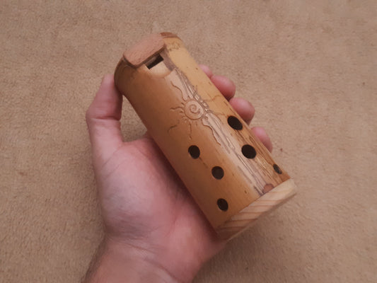 Native American Style Bamboo Ocarina in the key of F. Ethnic vessel flute in F minor pentatonic scale.