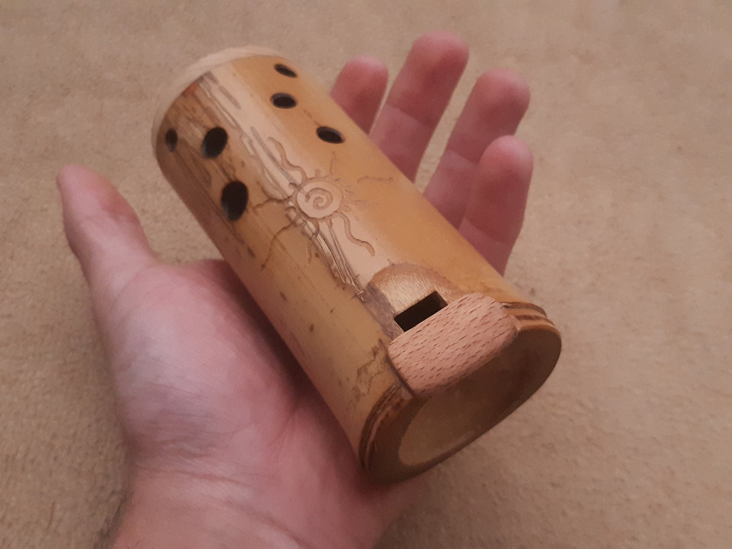 Native American Style Bamboo Ocarina in the key of F. Ethnic vessel flute in F minor pentatonic scale.