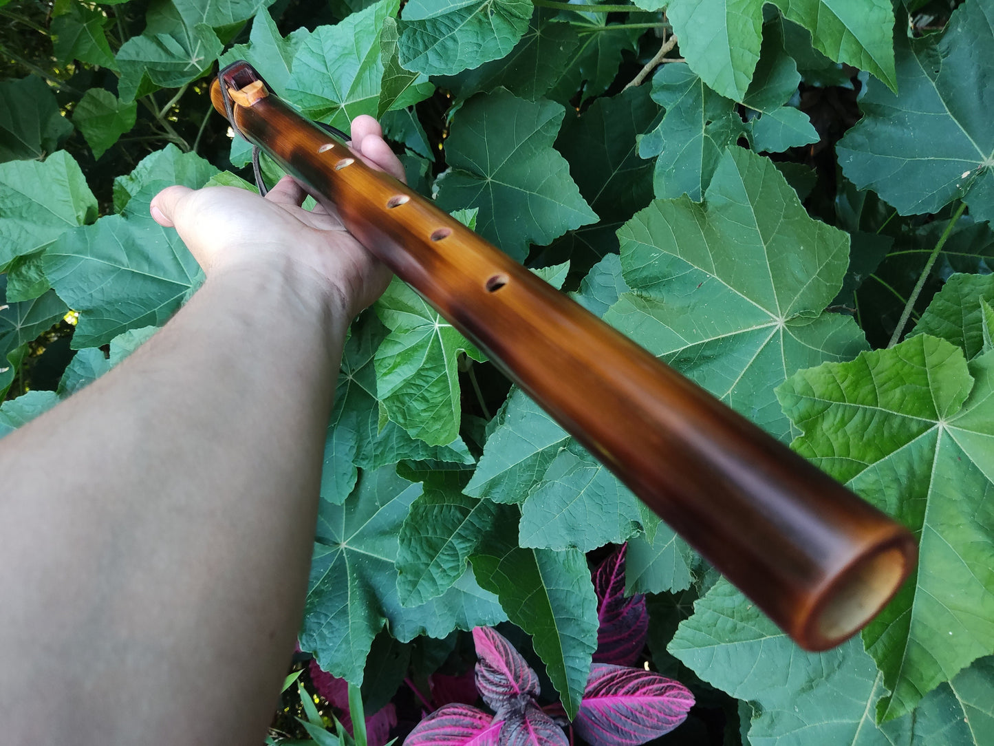 Ethnic Native American and Oriental bamboo flute in the key of low D. Low D NA deep meditation flute. Rustic flute. Indian flute