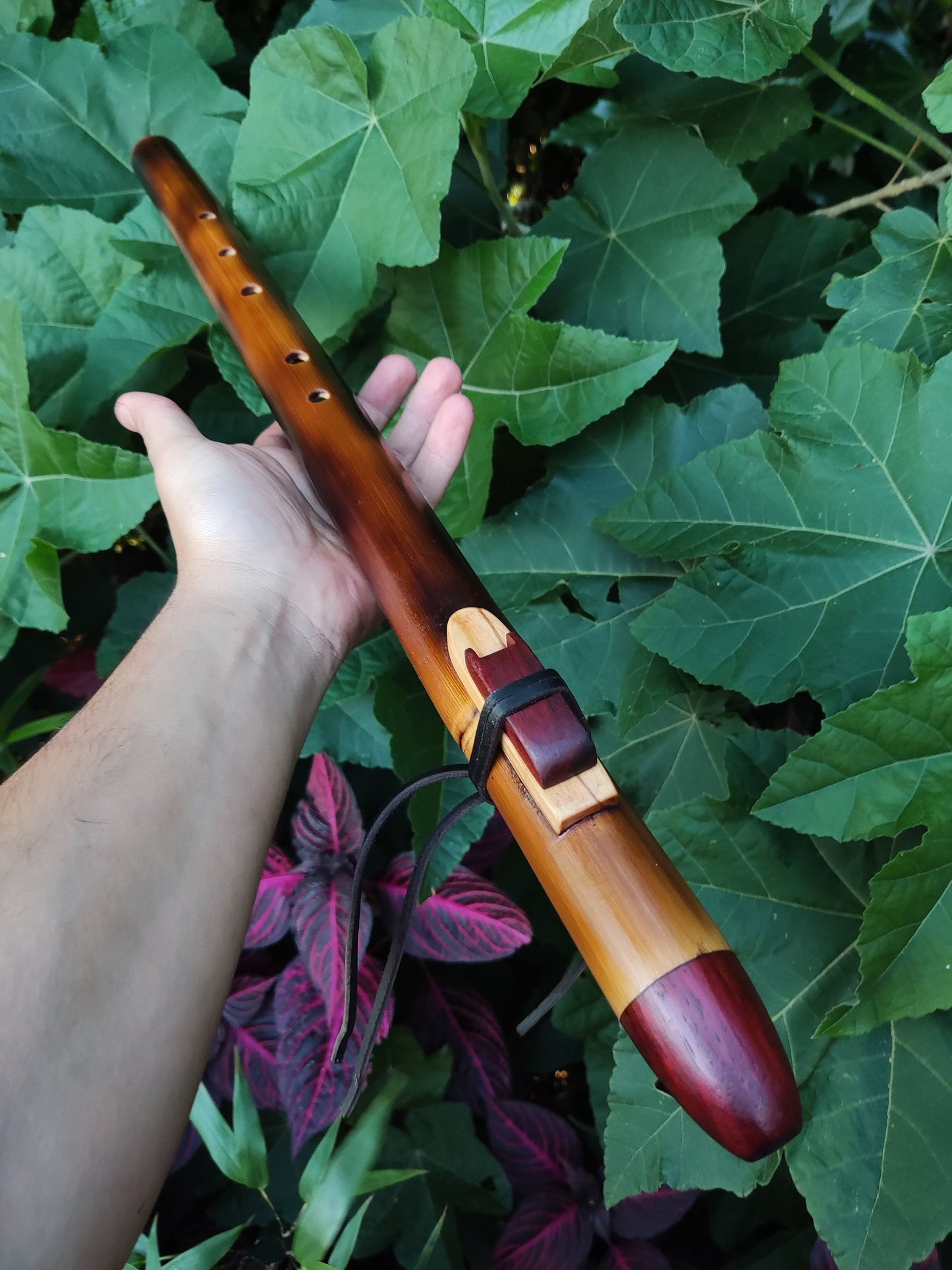 Ethnic Native American and Oriental bamboo flute in the key of low D. Low D NA deep meditation flute. Rustic flute. Indian flute