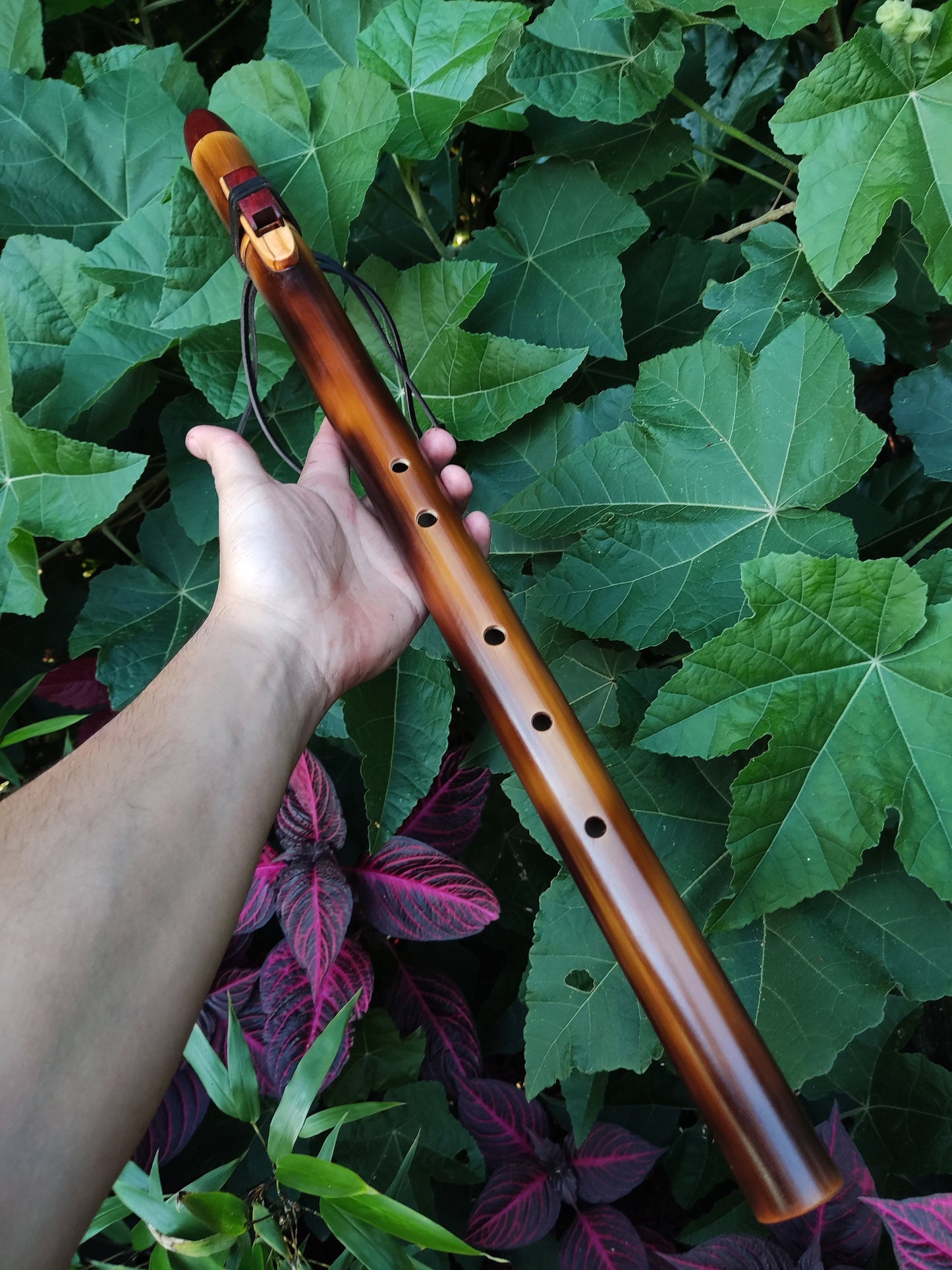 Ethnic Native American and Oriental bamboo flute in the key of low D. Low D NA deep meditation flute. Rustic flute. Indian flute