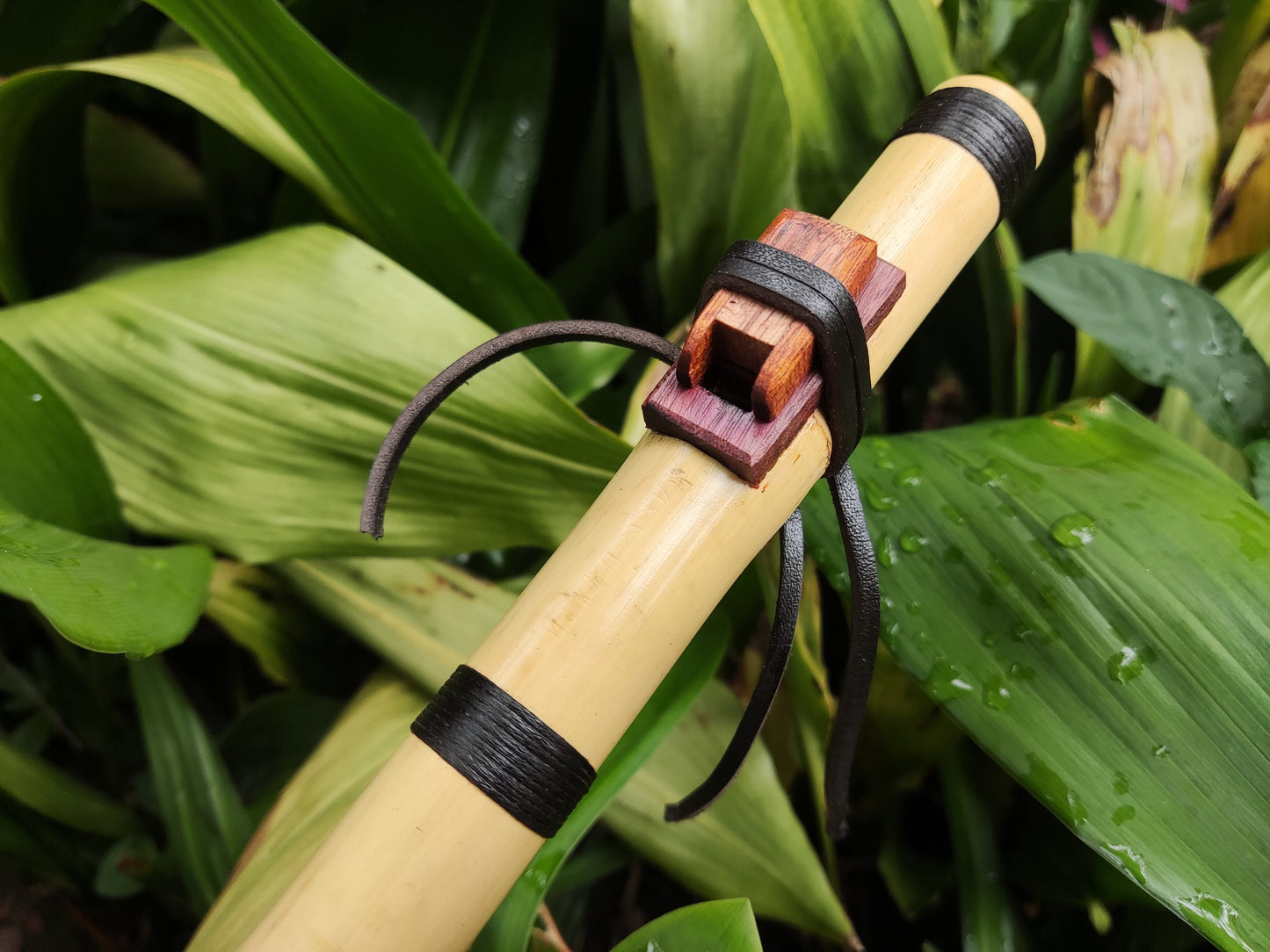 Native American Style bamboo flute in the key of A. Ethnic Native flute. Rustic bamboo flute. NA Flute in the key of A