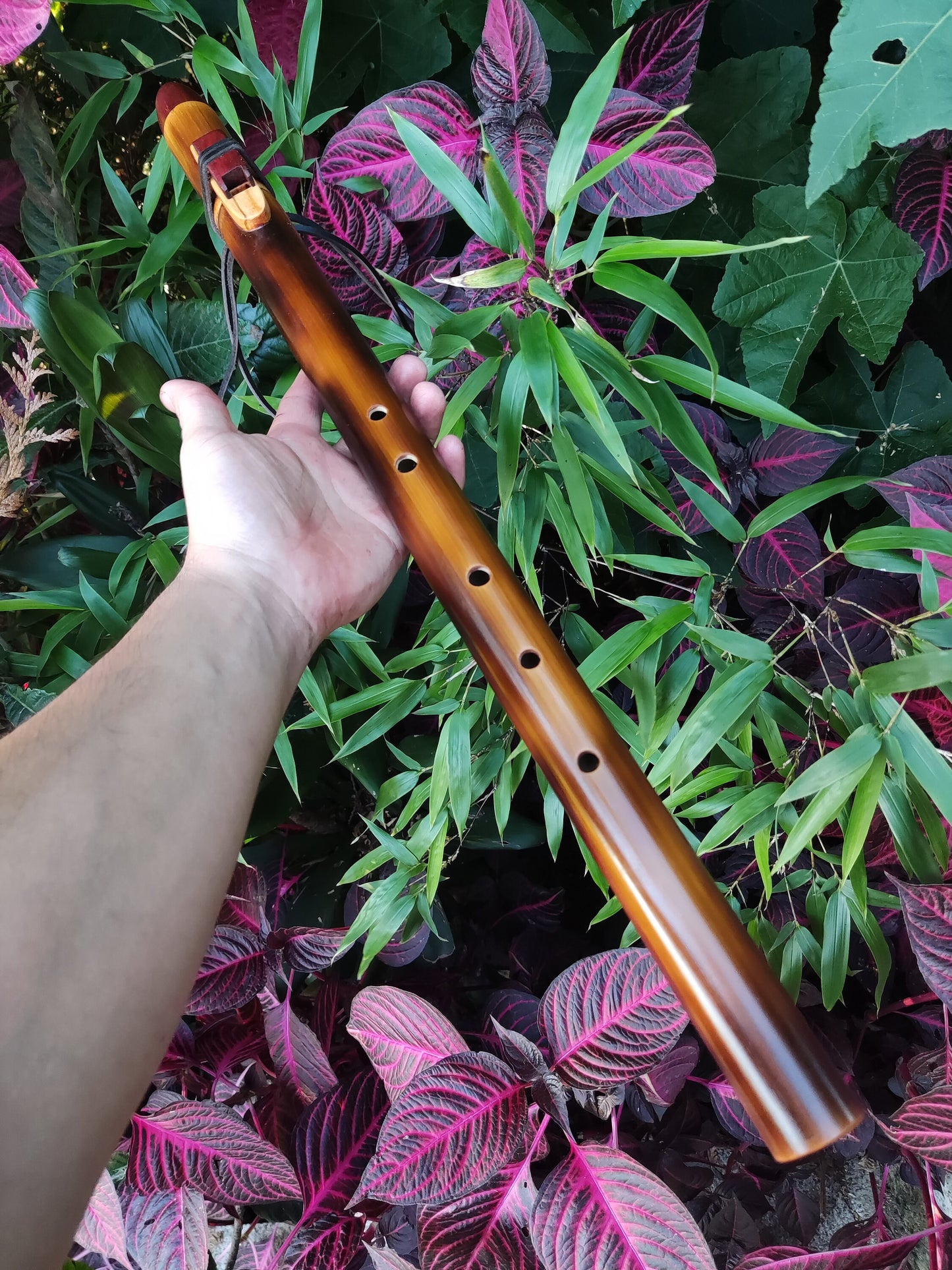 Ethnic Native American and Oriental bamboo flute in the key of low D. Low D NA deep meditation flute. Rustic flute. Indian flute