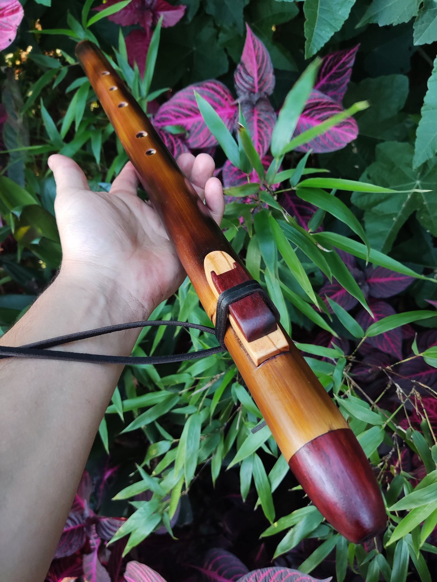 Ethnic Native American and Oriental bamboo flute in the key of low D. Low D NA deep meditation flute. Rustic flute. Indian flute
