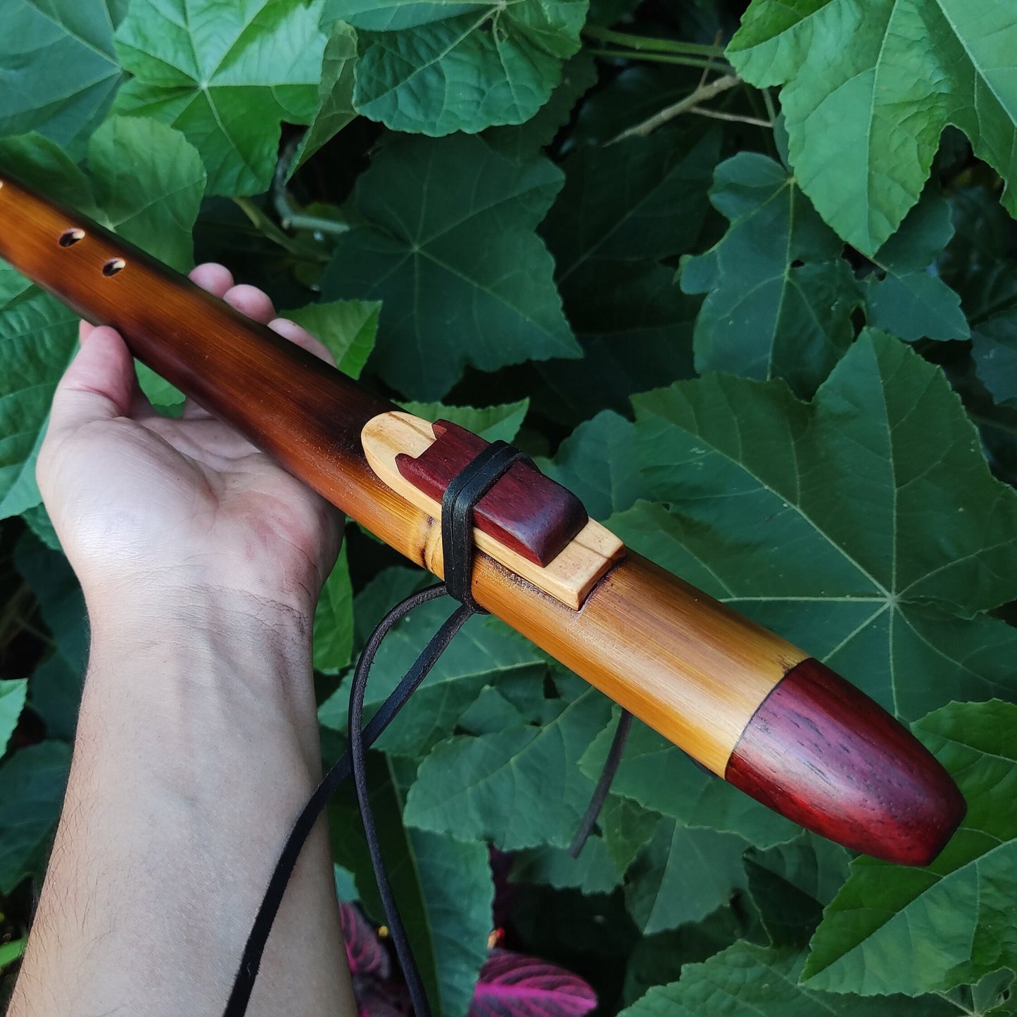 Ethnic Native American and Oriental bamboo flute in the key of low D. Low D NA deep meditation flute. Rustic flute. Indian flute